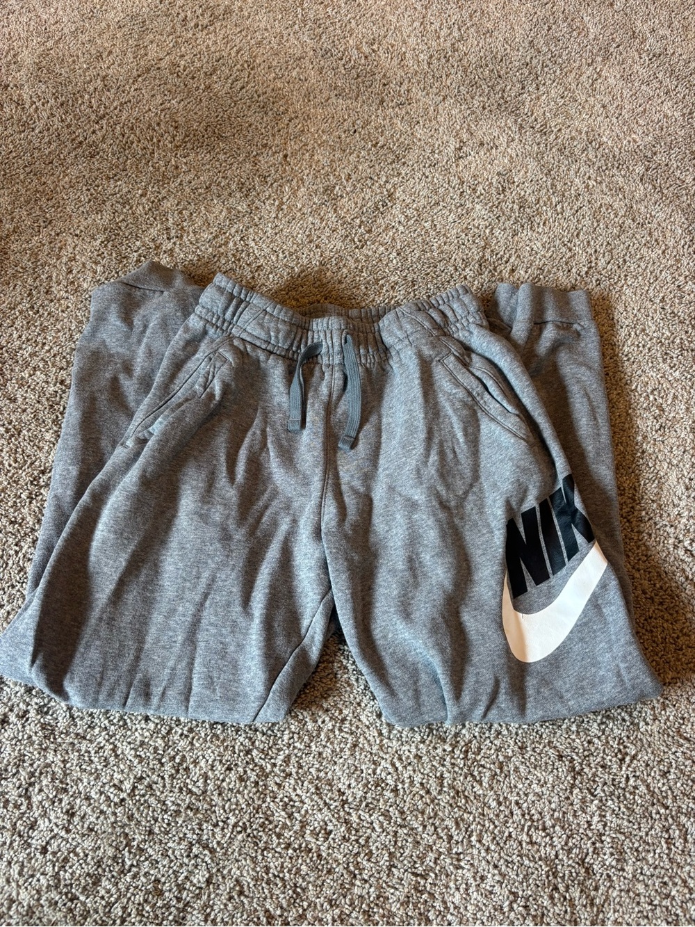 Nike Light Grey Youth Fleece Joggers with White Swoosh